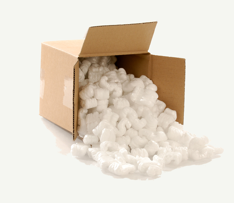 Cardboard moving box filled with polystyrene or natural cornstarch foam chips